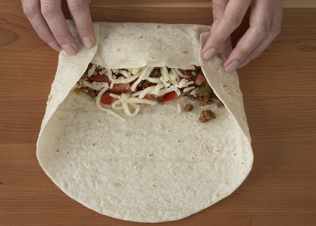 burrito being rolled up