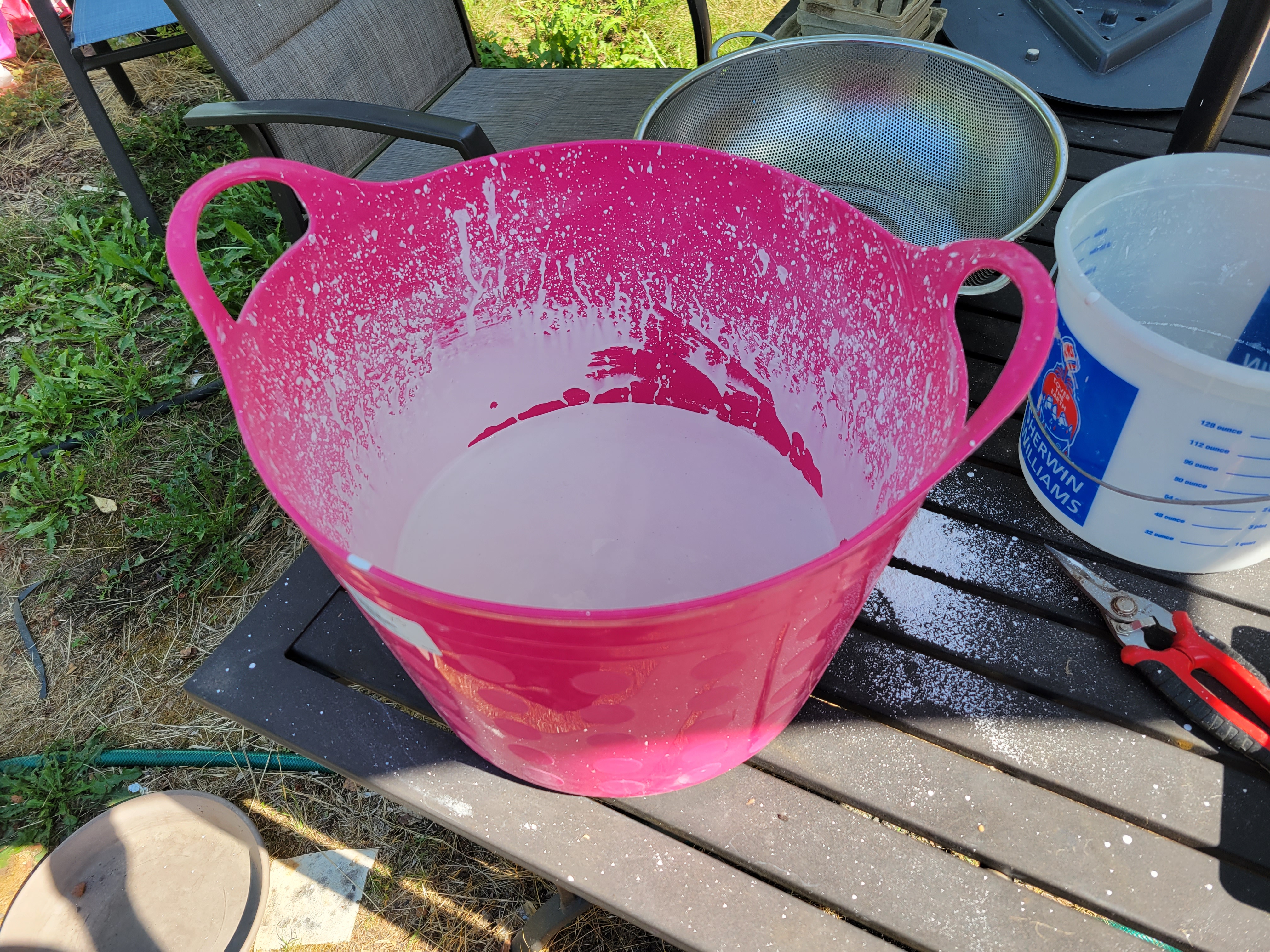 flexible feed bucket now full of fully mixed plaster